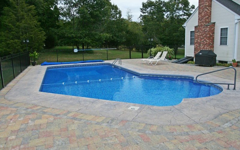 This is a picture of a Custom Lazy L Inground Pool installed by julianos