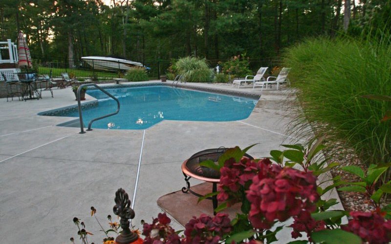 This is a photo of a Lazy L style custom inground swimming pool.